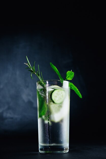 Fresh Summer Drink. Healthy glass detox fizzy water with lemon, mint, rosemary and cucumber in mason jar. Healthy food concept. Detox diet.