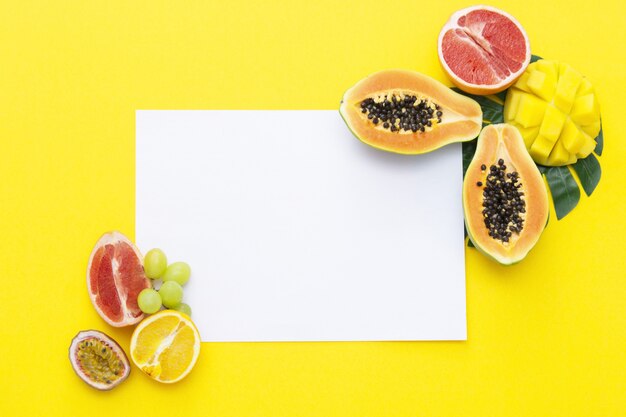 Fresh summer exotic fruits with a paper