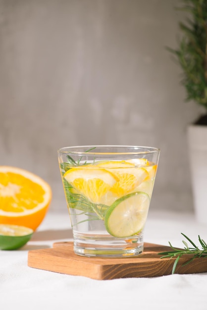 Fresh summer lemonade with citrus orange and rosemary