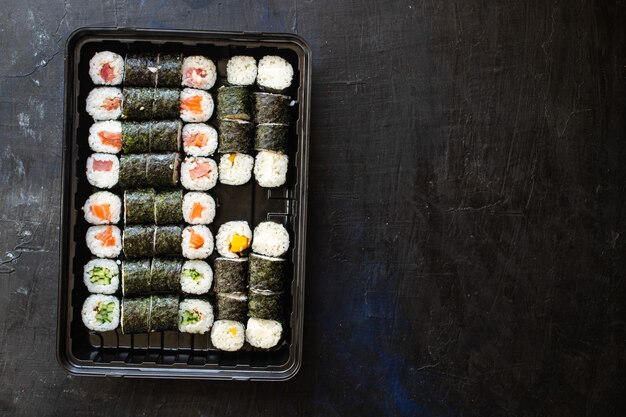 fresh sushi roll seafood multicolored maki susi salmon tuna rice nori wasabi sesame asian food