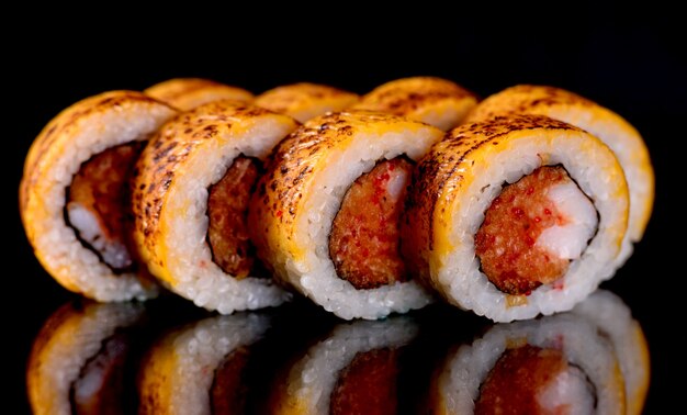 Fresh sushi rolls prepared from the best varieties of fish and seafood