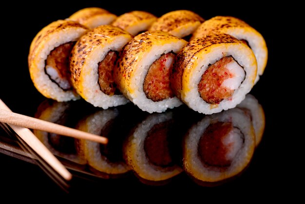 Fresh sushi rolls prepared from the best varieties of fish and seafood