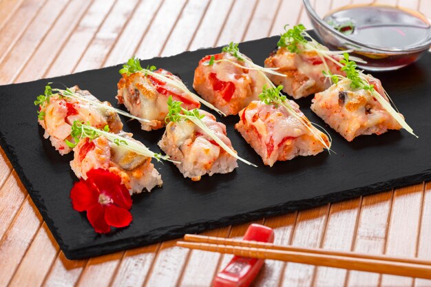 fresh sushi on rustic wooden table