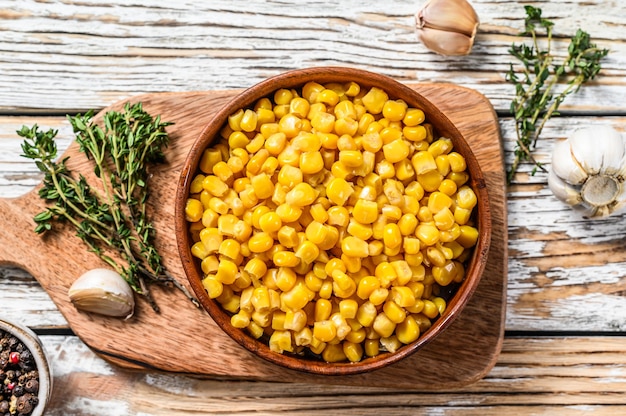 Fresh sweet canned corn on the table