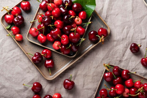 Fresh sweet cherry with green leaves