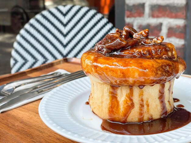 Fresh sweet homemade Brioche bread topped with pecan nut and caramel in French style