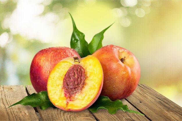 Fresh sweet peaches isolated on  background