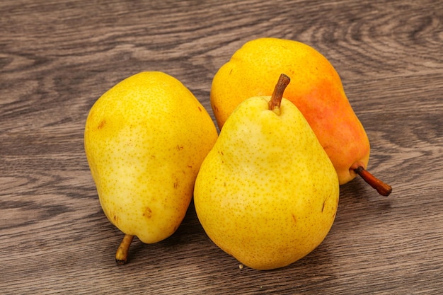 Fresh sweet pear over background