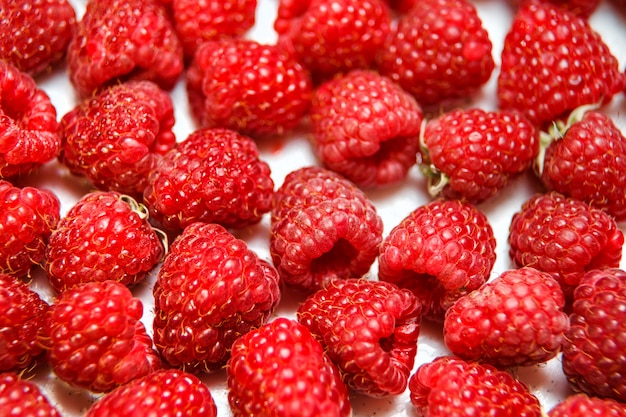 Fresh and sweet raspberries background