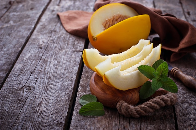 Fresh sweet sliced melon with mint