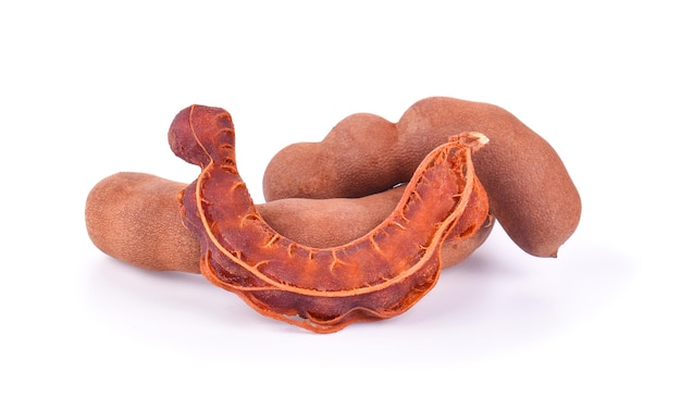 Fresh tamarind fruits on white background