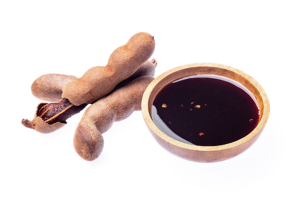 Fresh tamarind sauce isolated on white.