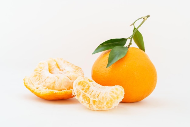 Fresh tangerine on white background