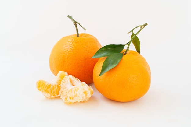 Fresh tangerine on white background