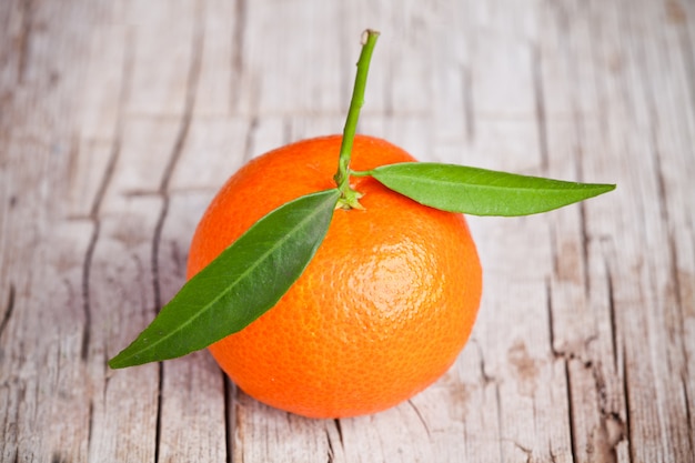 Fresh tangerine with leaves 