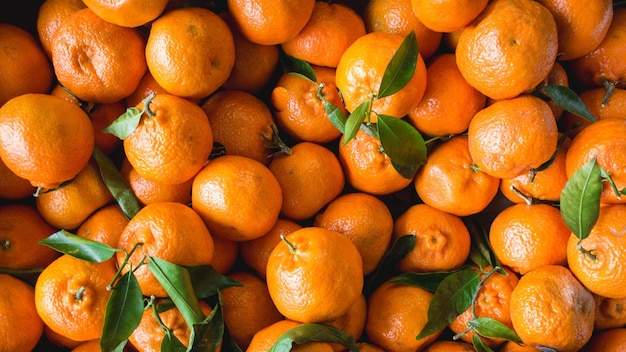 Photo fresh tangerines fruit with leaves. health and fitness concept