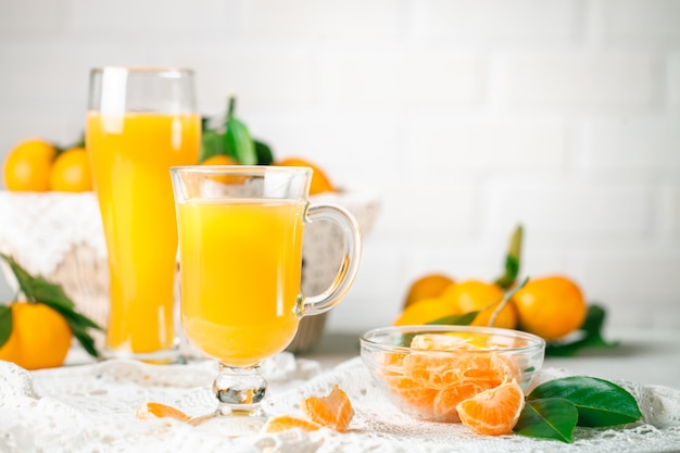 Fresh tangerines and tangerine juice