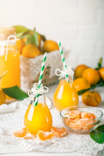 Fresh tangerines and tangerine juice. 