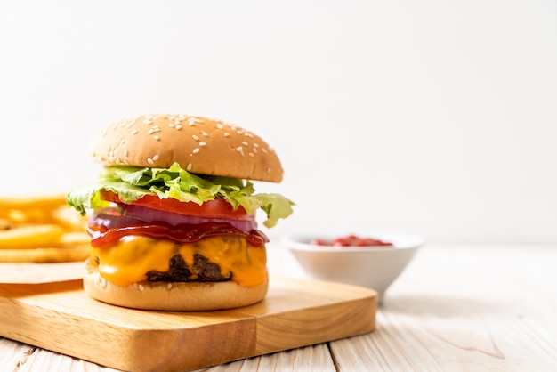 fresh tasty beef burger with cheese and ketchup