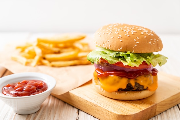 fresh tasty beef burger with cheese and ketchup