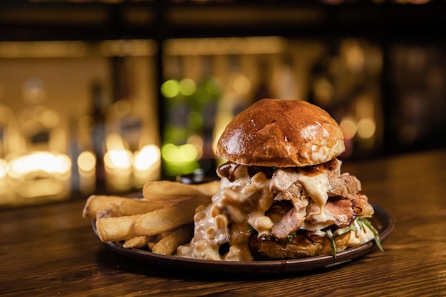 Fresh tasty burger on dark background