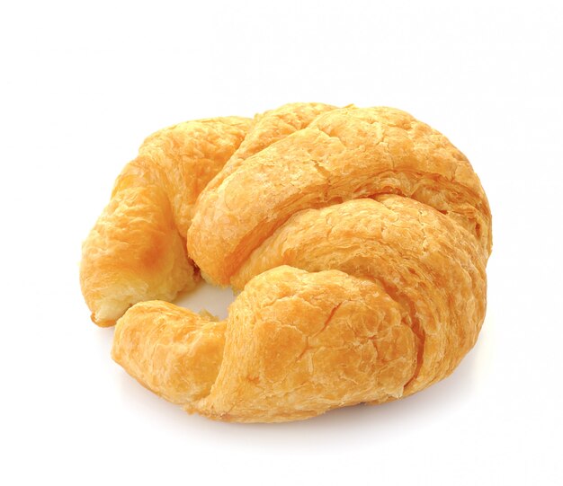 Fresh and tasty croissant over white wall