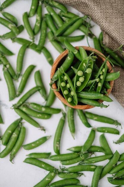 Fresh tasty green peas in a bowl