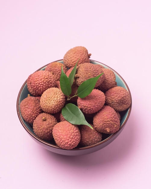 Fresh and Tasty Lychee in Bowl on Pink Background Top View Horizontal Organic Tasty Fruits