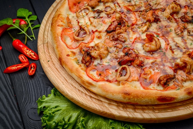 Fresh and tasty pizza with seafood