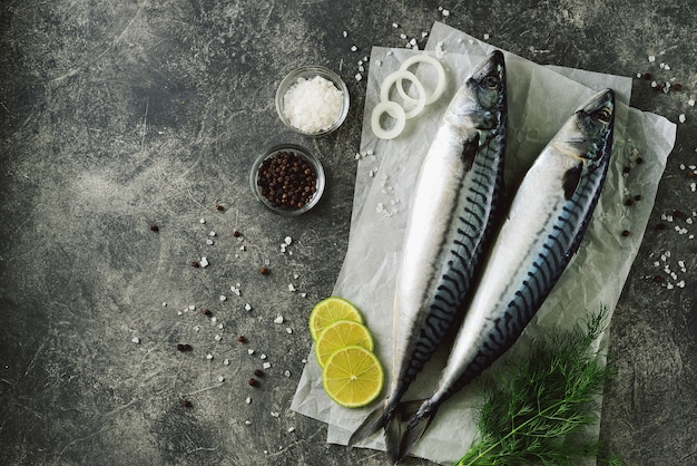 Fresh tasty raw mackerel with dill, lime, sea salt, and black pepper