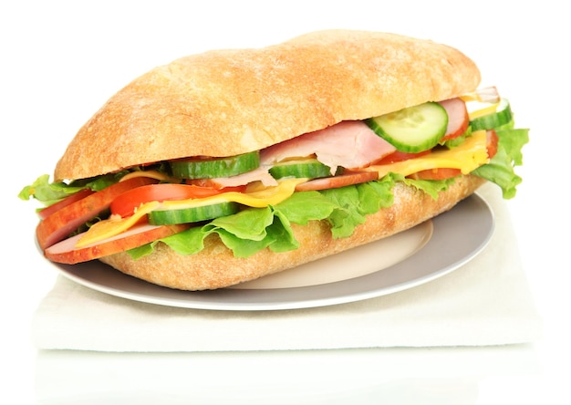 Fresh and tasty sandwich with ham and vegetables isolated on white