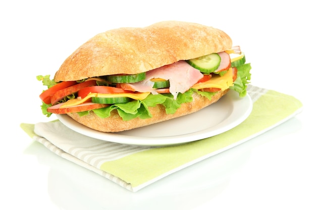 Fresh and tasty sandwich with ham and vegetables on white