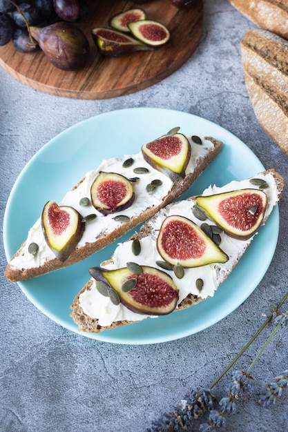 Fresh toast with cream cheese figs and pumpkin seeds