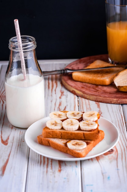 Fresh toast with salted caramel and banana. Delicious breakfast