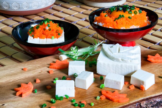 Fresh Tofu Japanese style set in carved shape with meple leaf decorated with scallion