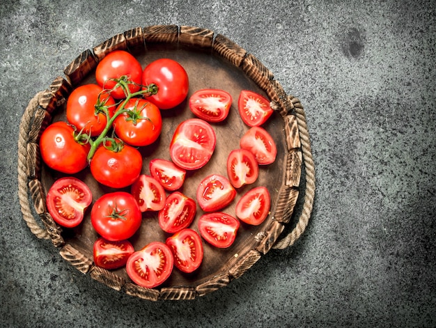 Fresh tomatoes on the tray