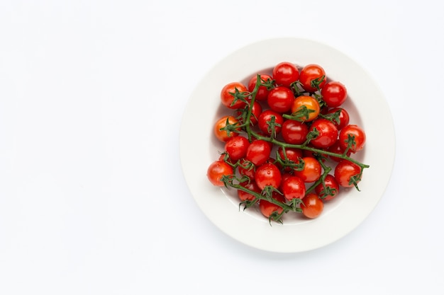 Fresh tomatoes, whole and half cut isolated. Top view