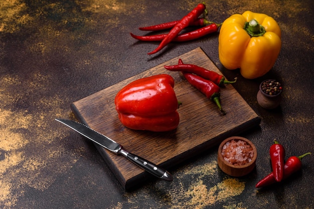 Fresh torn red sweet pepper from the autumn harvest