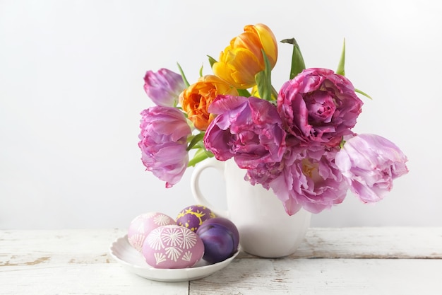 Fresh tulip flowers bouquet with egg