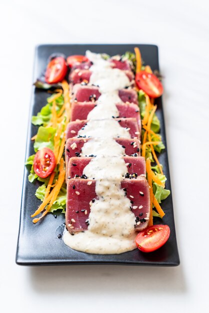 fresh tuna raw with vegetable salad and sauce