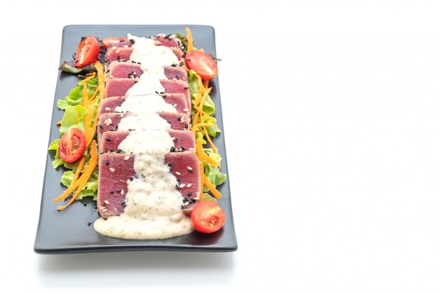 fresh tuna raw with vegetable salad and sauce