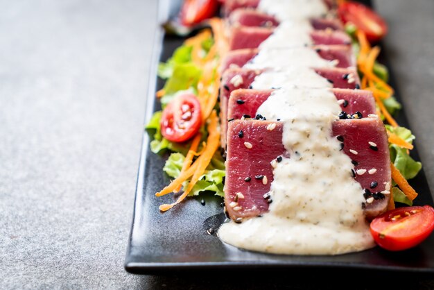 fresh tuna raw with vegetable salad and sauce