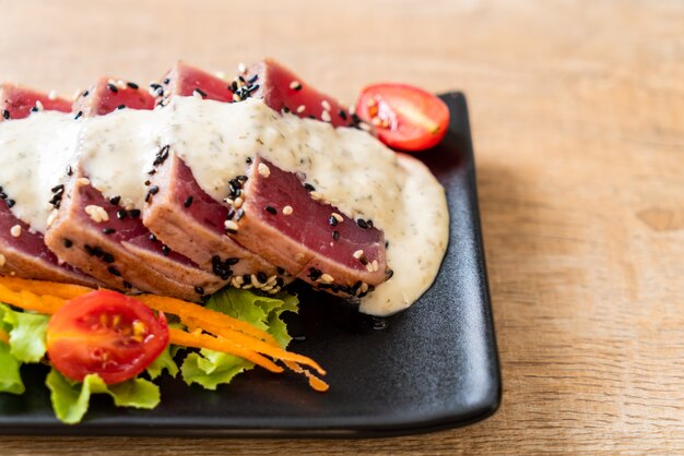 fresh tuna raw with vegetable salad and sauce