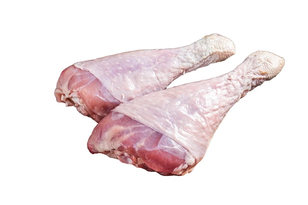 Fresh turkey legs Drumsticks raw Poultry meat with butcher cleaver Isolated on white background