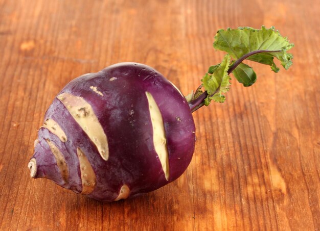 Fresh turnip on wooden background