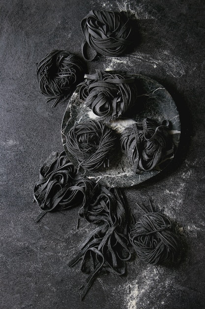 Fresh uncooked black pasta