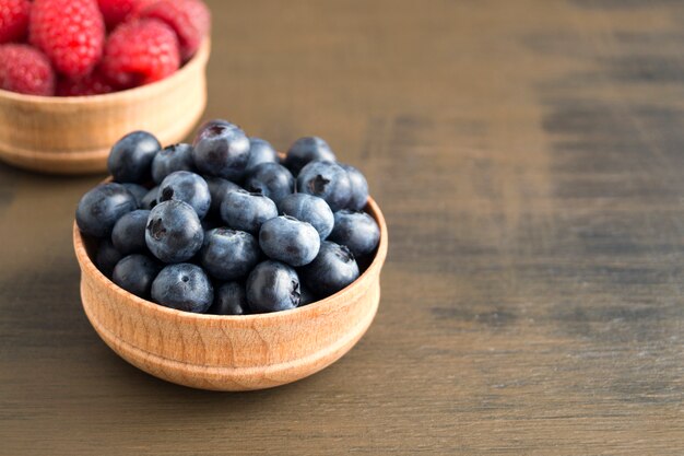 Fresh useful blueberries on a black background.