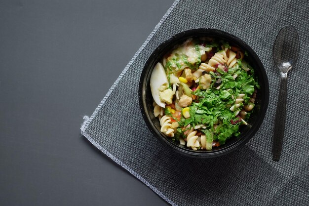 Fresh vegetable salad bowl on table