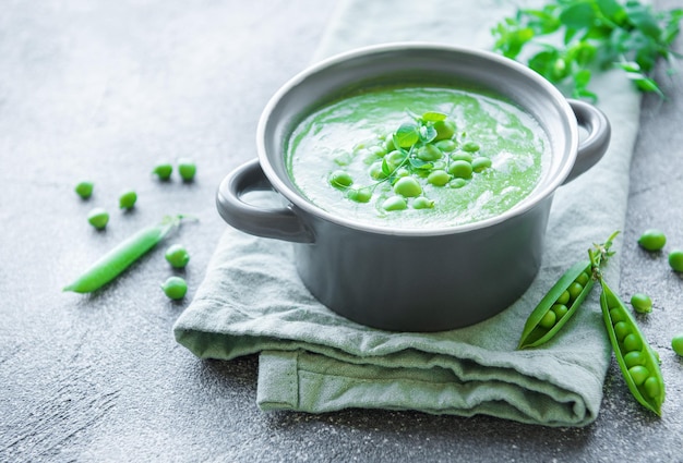 Fresh vegetable soup made of green peas