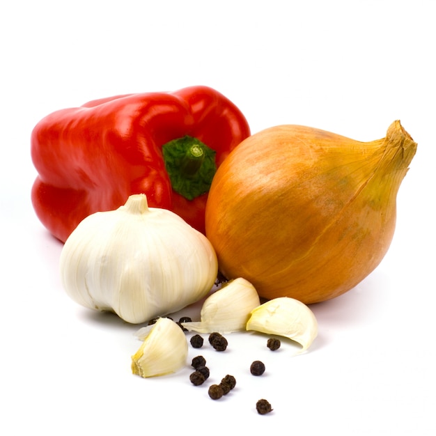 Fresh vegetables and black pepper on white background